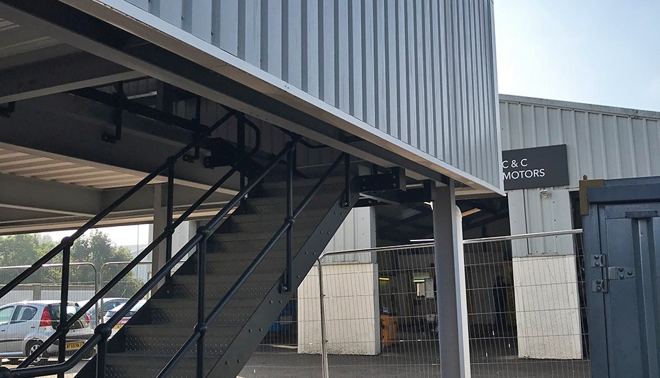 West Coast Imports warehouse staircase